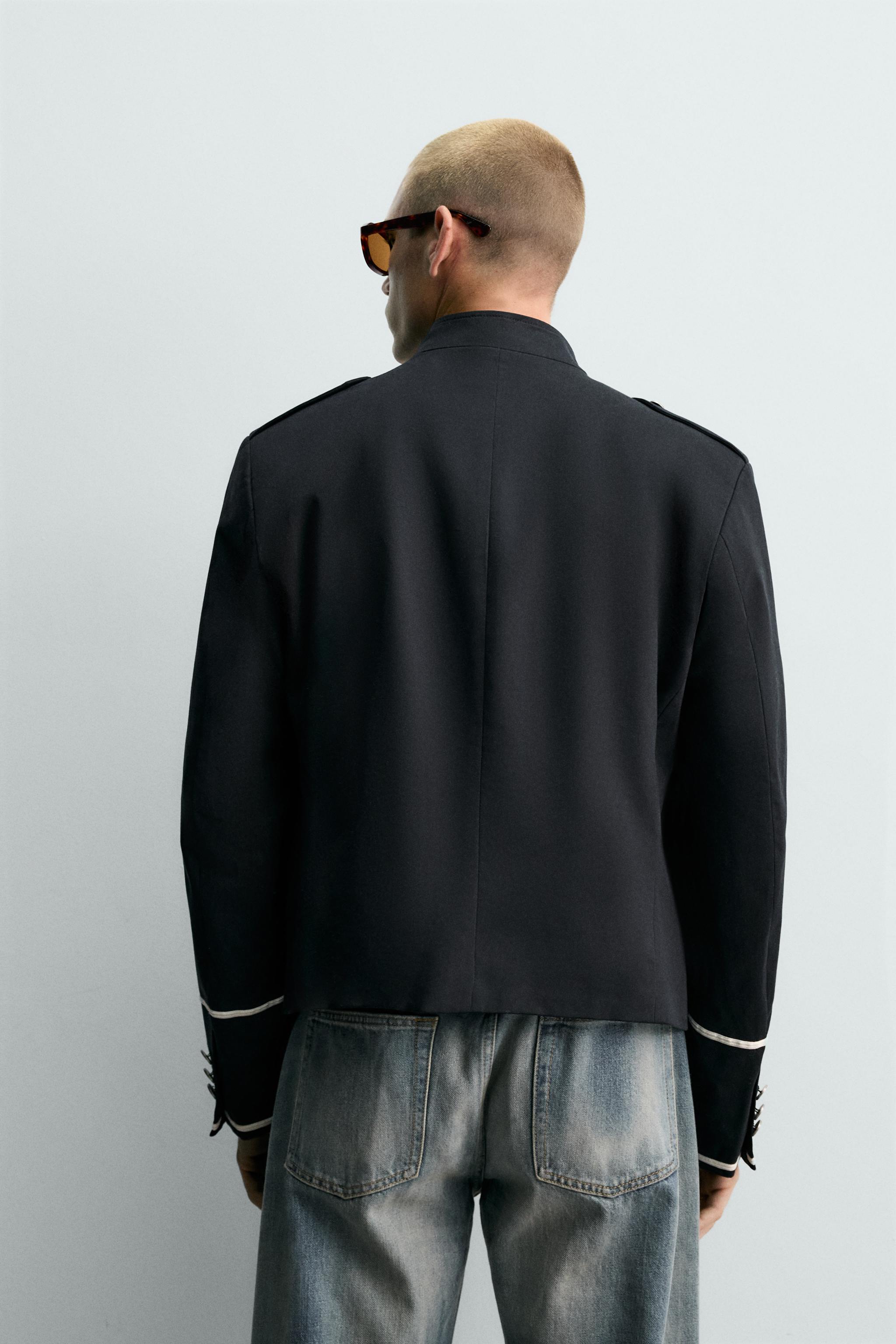 VESTE COURTE À CONTRASTES